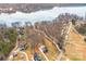 Overhead view of multiple homes, with a lake and a neighborhood at 247 Reese Wilson Rd, Belmont, NC 28012