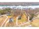 A waterfront property with luxurious houses overlooking a beautiful body of water in a serene environment at 247 Reese Wilson Rd, Belmont, NC 28012