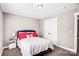 Bedroom with carpet, closet, and a white nightstand next to the bed at 247 Reese Wilson Rd, Belmont, NC 28012