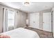 Bright bedroom with carpet flooring, closet, and natural light from the window at 247 Reese Wilson Rd, Belmont, NC 28012