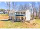 Stylish two-story home featuring stone accents, landscaped yard, and a cozy front porch at 247 Reese Wilson Rd, Belmont, NC 28012