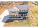 Charming two-story home features stone accents, well-maintained landscaping, and a welcoming front porch at 247 Reese Wilson Rd, Belmont, NC 28012