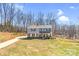Two-story home featuring stone accents, a well-manicured lawn, and a welcoming front porch at 247 Reese Wilson Rd, Belmont, NC 28012