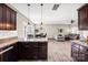Open-concept living area with hardwood floors, dining area and comfortable seating at 247 Reese Wilson Rd, Belmont, NC 28012
