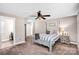 Relaxing main bedroom with a ceiling fan and neutral decor at 247 Reese Wilson Rd, Belmont, NC 28012