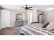 Comfortable main bedroom featuring a ceiling fan and neutral decor at 247 Reese Wilson Rd, Belmont, NC 28012