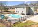 Backyard featuring a private in-ground pool, patio area, outdoor seating and dining, and a lush green lawn at 247 Reese Wilson Rd, Belmont, NC 28012