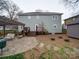Expansive backyard with a patio, pergola, and lush landscaping at 2729 Duncan Ave, Charlotte, NC 28205