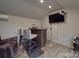 Rustic basement bar area with seating and entertainment space at 2729 Duncan Ave, Charlotte, NC 28205