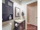 Bathroom features a granite countertop vanity, and updated fixtures at 2729 Duncan Ave, Charlotte, NC 28205