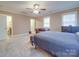 Bedroom featuring a ceiling fan, carpet, and natural light at 2729 Duncan Ave, Charlotte, NC 28205