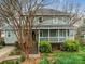 Charming two-story home with a welcoming front porch and well-maintained landscaping at 2729 Duncan Ave, Charlotte, NC 28205