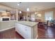 Open kitchen featuring a large island with granite countertop, seamless flow to living and dining areas at 2729 Duncan Ave, Charlotte, NC 28205