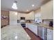 Bright kitchen features stainless steel appliances, granite countertops, and ample cabinet storage at 2729 Duncan Ave, Charlotte, NC 28205