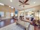 Spacious living room featuring hardwood floors and neutral color palette, and seamless transition to dining room and kitchen at 2729 Duncan Ave, Charlotte, NC 28205