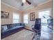Cozy office space featuring a large couch, natural light, and work space at 2729 Duncan Ave, Charlotte, NC 28205