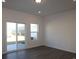 Bright living room featuring a sliding glass door providing backyard views at 3509 Nimbell Rd, Monroe, NC 28110
