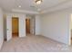 Spacious bedroom with neutral walls, plush carpeting, and a walk-in closet at 3562 Nimbell Rd, Monroe, NC 28110