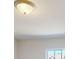 White ceiling with a light fixture and a window in the background at 3562 Nimbell Rd, Monroe, NC 28110