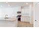 Modern kitchen with white cabinets, stainless steel appliances, and granite countertops at 3562 Nimbell Rd, Monroe, NC 28110