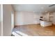 Open-concept living space with wood floors, stainless appliances, and a kitchen island at 3562 Nimbell Rd, Monroe, NC 28110