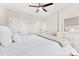 Bedroom featuring an overhead fan, white furniture, and a comfortable bed at 40934 Deer Haven Dr, Albemarle, NC 28001