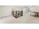 Spacious bonus room features neutral carpet, a modern staircase, and plenty of natural light at 40934 Deer Haven Dr, Albemarle, NC 28001