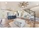 Bright, open concept living area with an island, stainless steel appliances, and hardwood floors at 40934 Deer Haven Dr, Albemarle, NC 28001