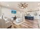 Bright, open concept living area with an island, stainless steel appliances, and hardwood floors at 40934 Deer Haven Dr, Albemarle, NC 28001