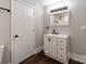 Updated bathroom boasts a stylish vanity, modern mirror, and tasteful fixtures at 412 Pear St, Gastonia, NC 28054