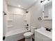 This bathroom features a shower-tub combo, a toilet, and a vanity at 412 Pear St, Gastonia, NC 28054