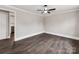 Bright and airy room featuring hardwood floors, a ceiling fan, and neutral paint, and white trim at 412 Pear St, Gastonia, NC 28054