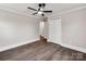 Large bedroom with ceiling fan and generous closet space, ready for your personal touch at 412 Pear St, Gastonia, NC 28054
