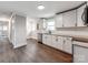 Contemporary kitchen boasting stainless steel appliances, granite counters, and new white cabinets at 412 Pear St, Gastonia, NC 28054