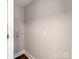 Neutral tone laundry area with new hookups ready for your washer and dryer at 412 Pear St, Gastonia, NC 28054