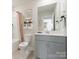 Well-lit bathroom featuring modern fixtures, neutral color palette, and stylish decor at 459 Olympia Way, York, SC 29745