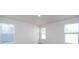 Bright bedroom featuring neutral walls, plush carpet, and windows offering natural light at 459 Olympia Way, York, SC 29745