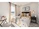 Inviting bedroom featuring a comfortable bed, stylish decor, and plenty of natural light at 459 Olympia Way, York, SC 29745