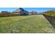 Expansive fenced backyard with a large grassy area, perfect for recreation and relaxation at 4812 Campobello Dr, Monroe, NC 28110