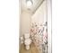 Bathroom featuring a floral shower curtain, toilet and tiled floors at 4812 Campobello Dr, Monroe, NC 28110