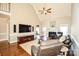Spacious living room with fireplace, hardwood floors, and vaulted ceiling at 4812 Campobello Dr, Monroe, NC 28110