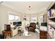 Home office with lots of natural light and hardwood floors at 4812 Campobello Dr, Monroe, NC 28110