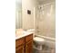 Bathroom featuring a clean shower, neutral colored walls, and a functional vanity at 5702 Burning Ridge Dr, Monroe, NC 28110