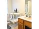 Bathroom featuring a single sink vanity, decorations and tiled flooring at 5702 Burning Ridge Dr, Monroe, NC 28110