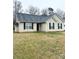 Inviting exterior featuring classic siding and a well-kept front lawn at 5702 Burning Ridge Dr, Monroe, NC 28110