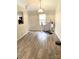 Bright living area featuring sleek wood floors and a modern, open layout at 5702 Burning Ridge Dr, Monroe, NC 28110