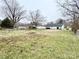Expansive backyard featuring mature trees and ample space for outdoor activities at 601 Apple St, Gastonia, NC 28054