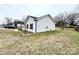 View of the side and front of the house showing the well maintained yard at 601 Apple St, Gastonia, NC 28054