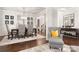 Bright dining room with hardwood floors, designer furnishings, and classic decor at 6112 Canyon Trl, Denver, NC 28037