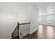 Bright hallway with hardwood floors and chandelier at 6112 Canyon Trl, Denver, NC 28037